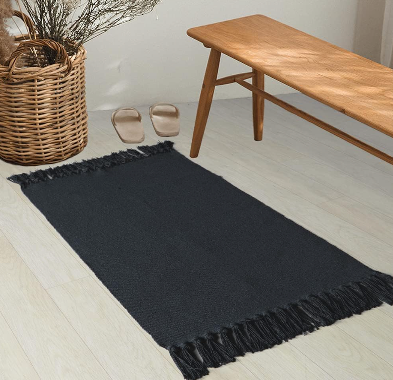 Solid Black With Tassels Layering Rug